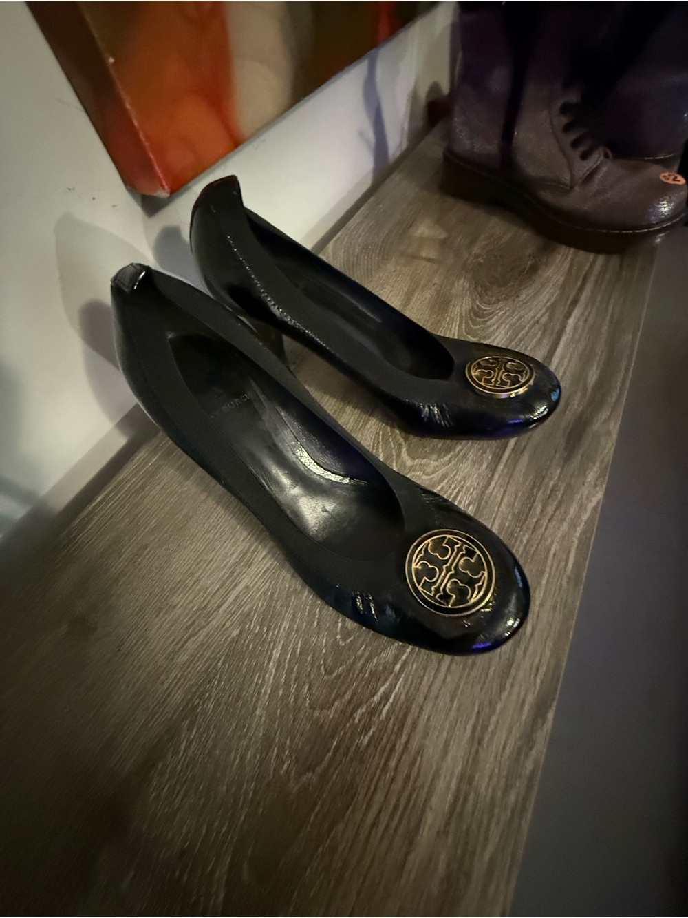 Tory Burch Black Patent Leather heels with Gold Logo Medallion